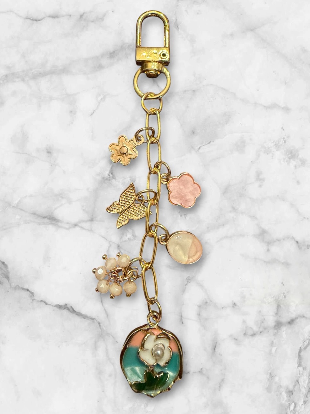 Gold-Tone Floral Charm Keychain with Pink and Teal Accents
